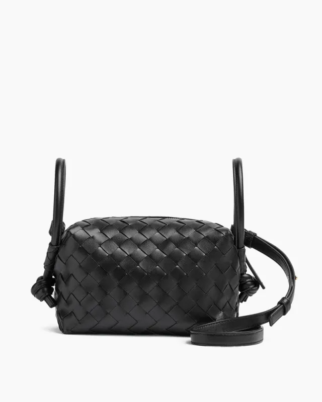 Women's Resort Escape Chic Woven Leather Travel Pouch sold by Larosa