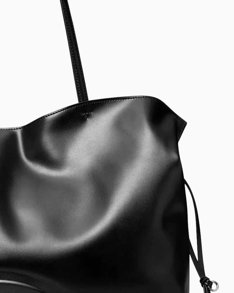 Small Sculpted Slouch Drawstring Leather Tote sold by Larosa product image thumbnail 3