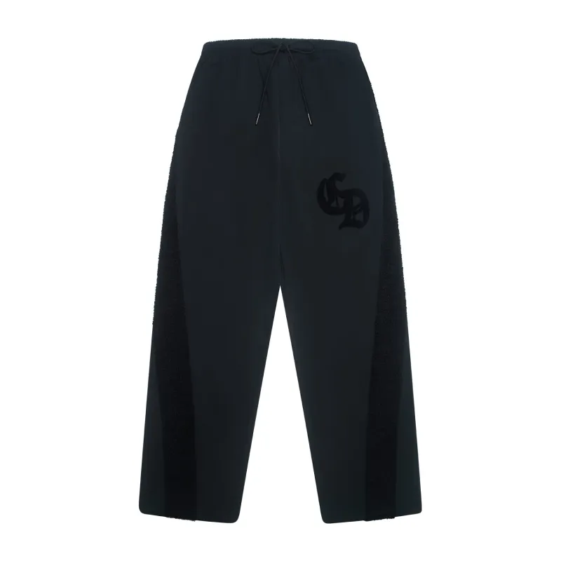 MICRO SHERPA & NYLON TRACK PANT sold by Criminal Damage