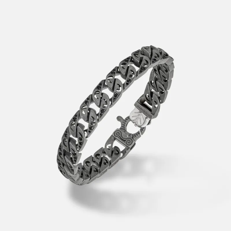 FLAMING TONGUE Molten Loop Wide Bracelet sold by Marco Dal Maso