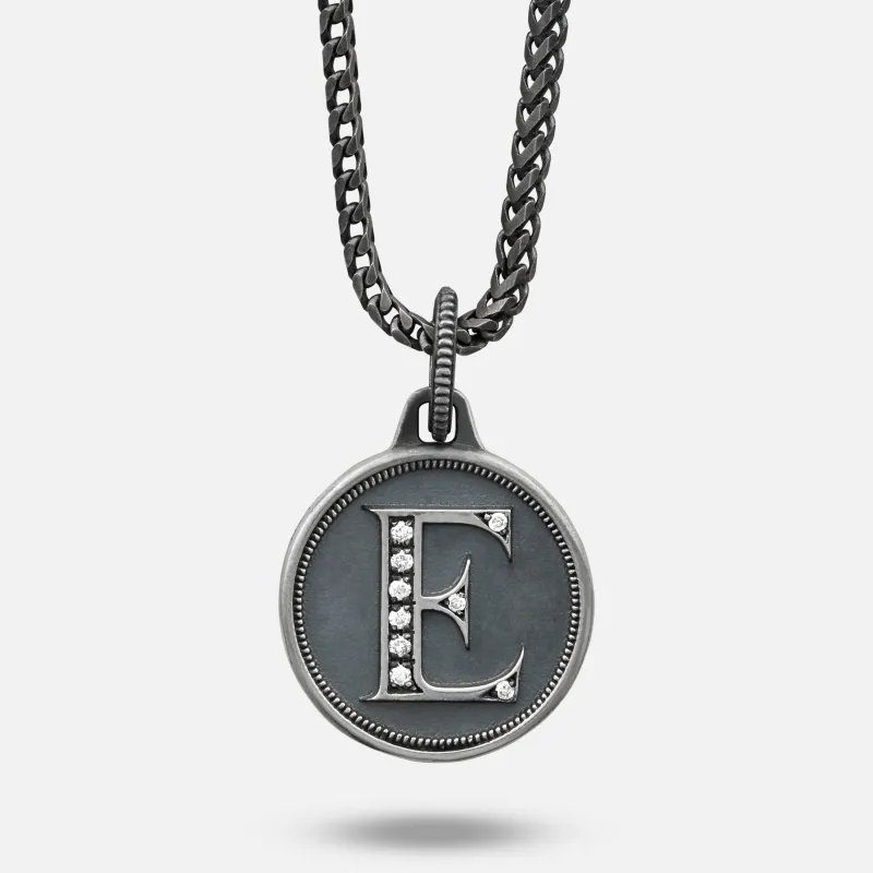 MONETA Initial 'E' Pendant sold by Marco Dal Maso
