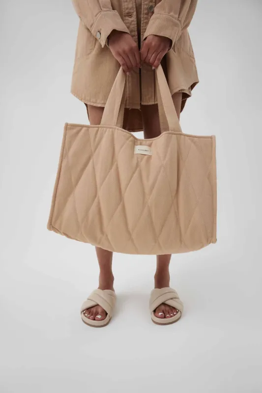 NUDE PUFFER BAG sold by Nude Lucy