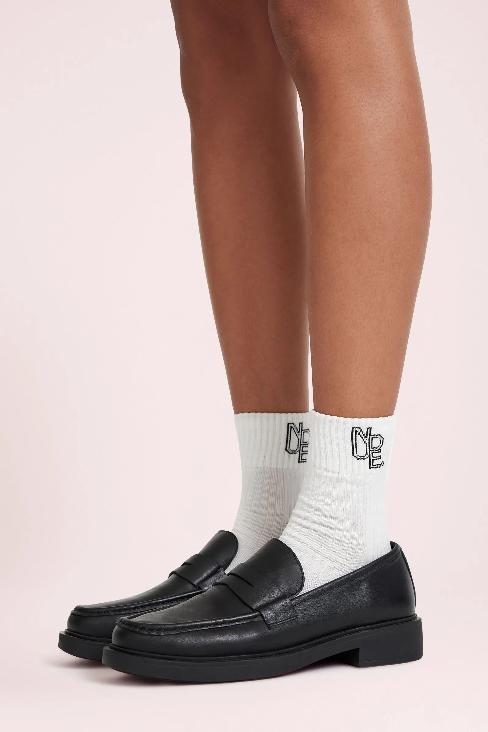 NUDE. EMBLEM SOCK sold by Nude Lucy