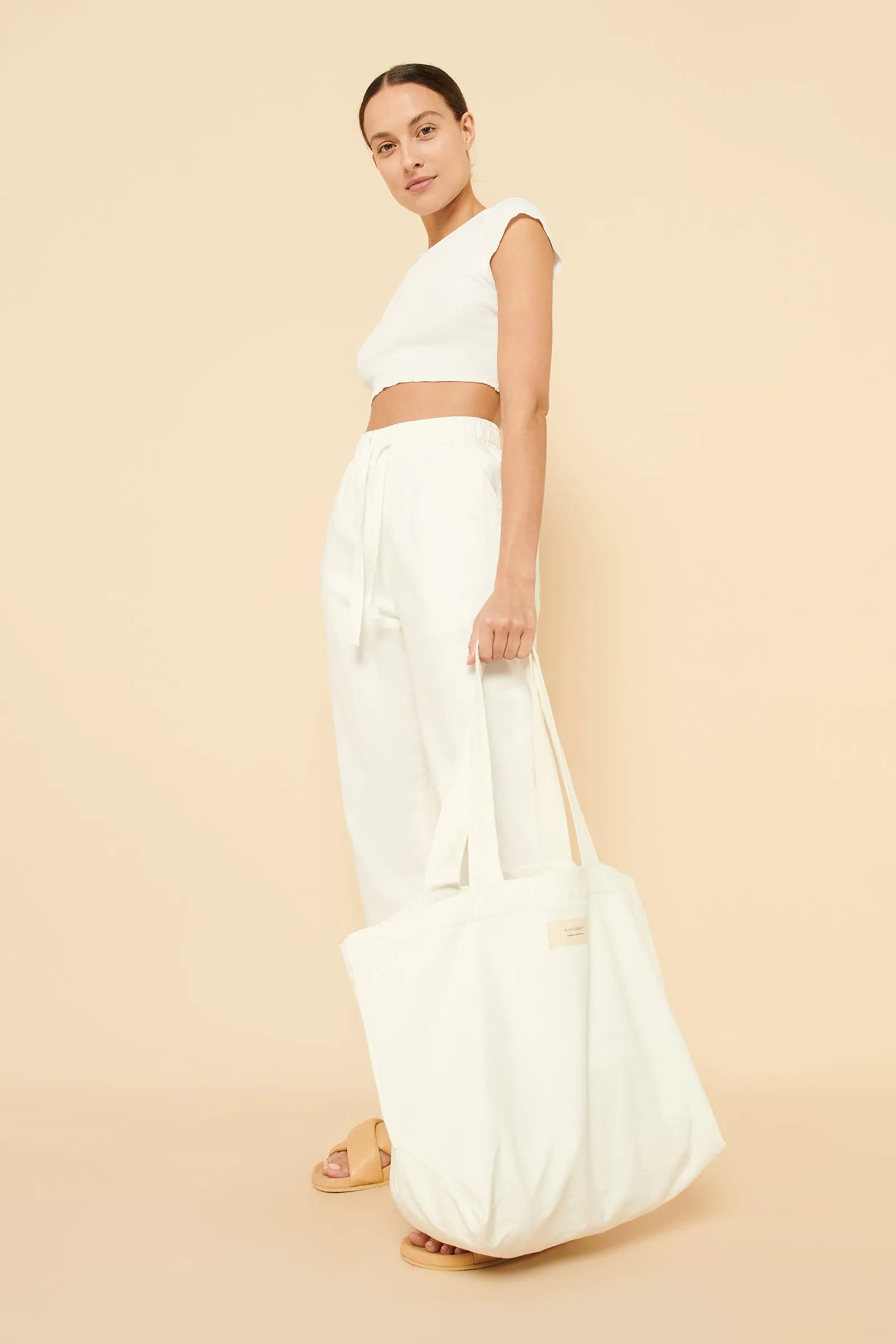 NUDE TRAVEL TOTE sold by Nude Lucy