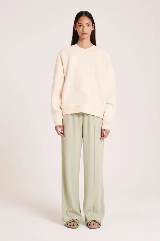 NUDE. EMBLEM SWEAT sold by Nude Lucy