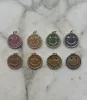 THE SEMI PAVÉ HAPPY FACE PENDANT sold by Lisa Gozlan