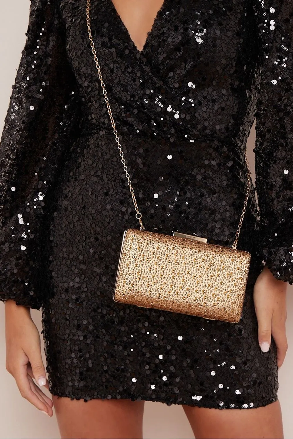 Gold Glitter Evening Clutch Bag by Aftershock London sold by Goddiva