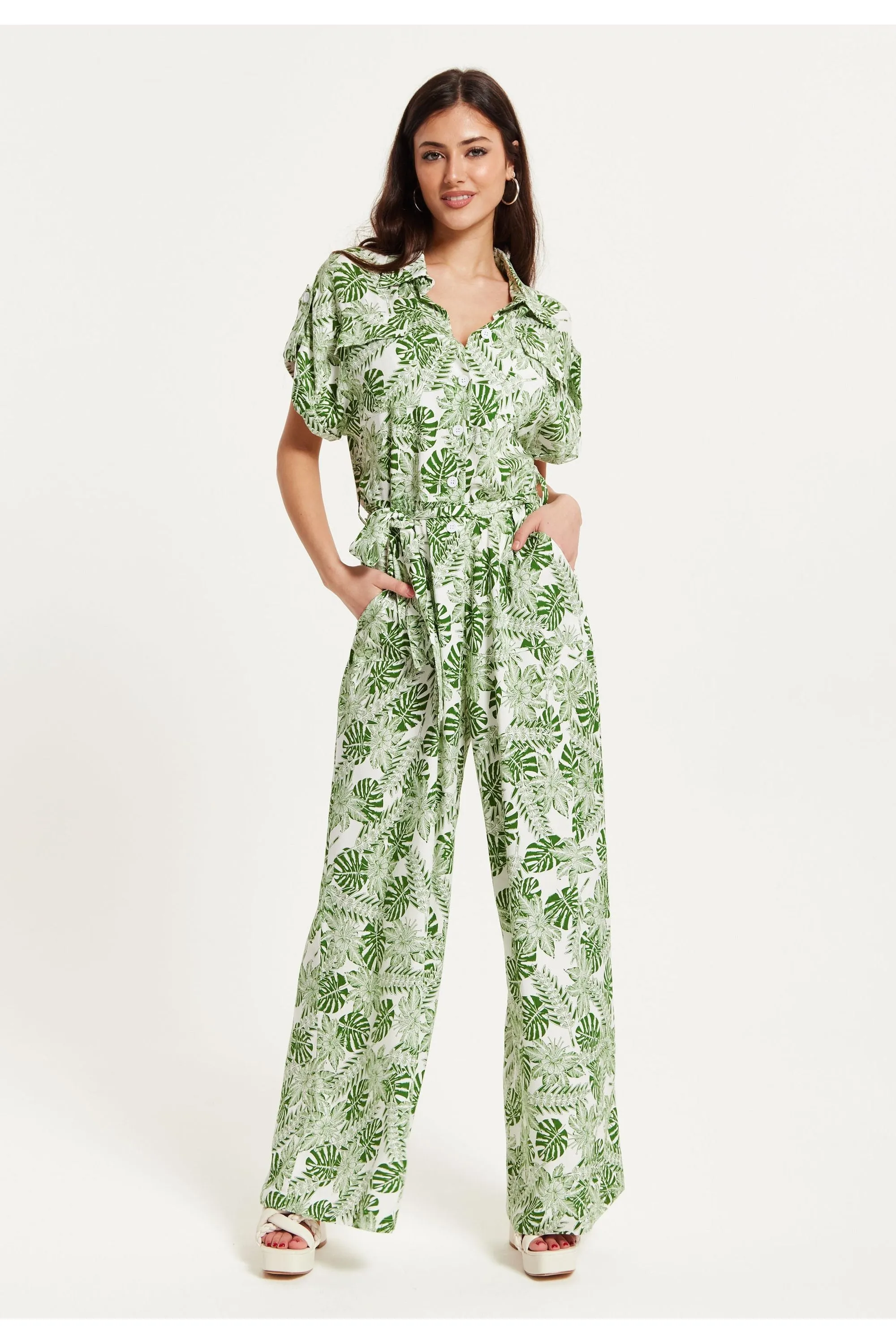 Green Leaf Printed Jumpsuit by Liquorish sold by Goddiva