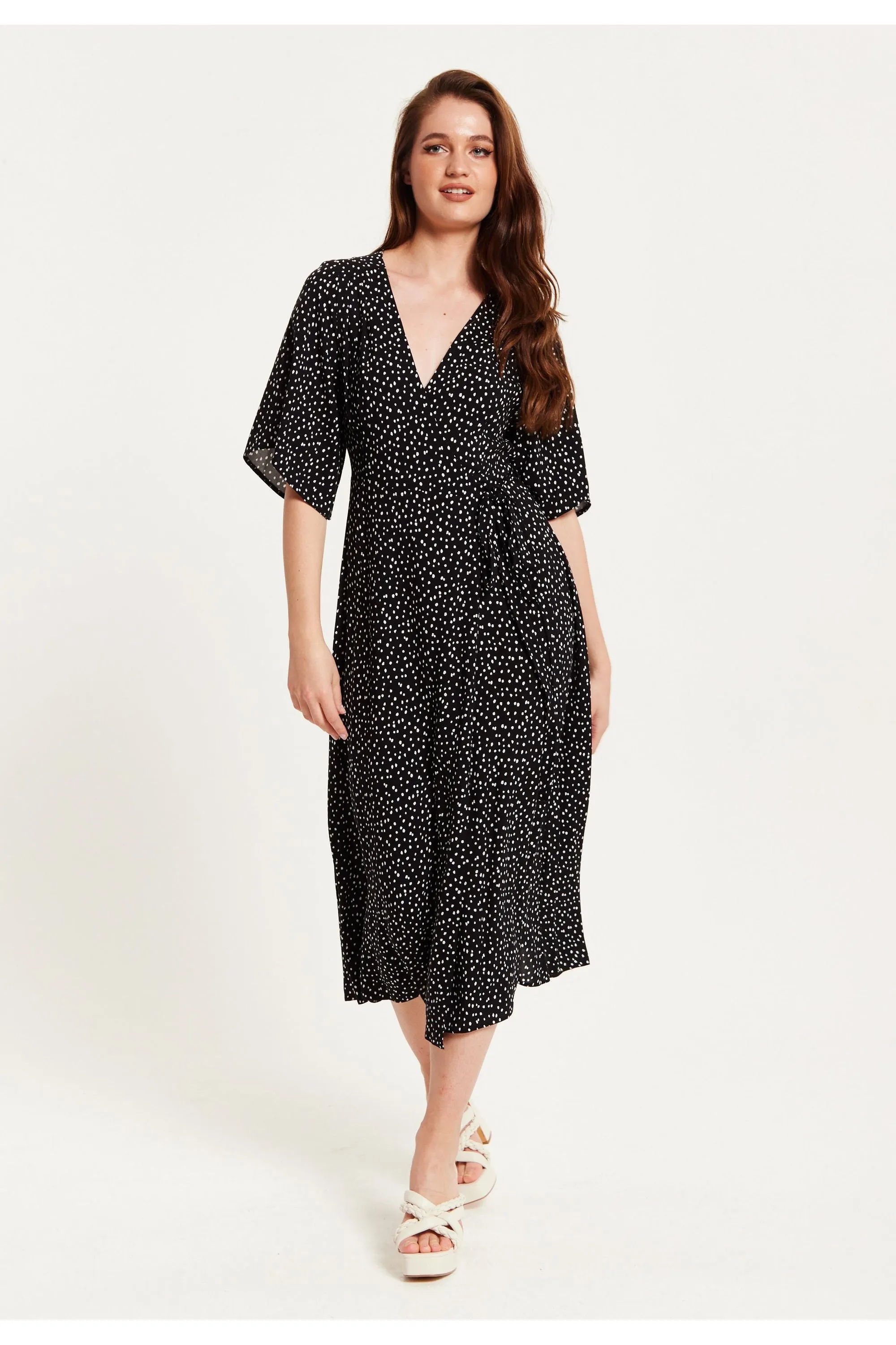 Liquorish Polka Dot Midi Wrap Dress In Black With Kimono Sleeves sold by Goddiva