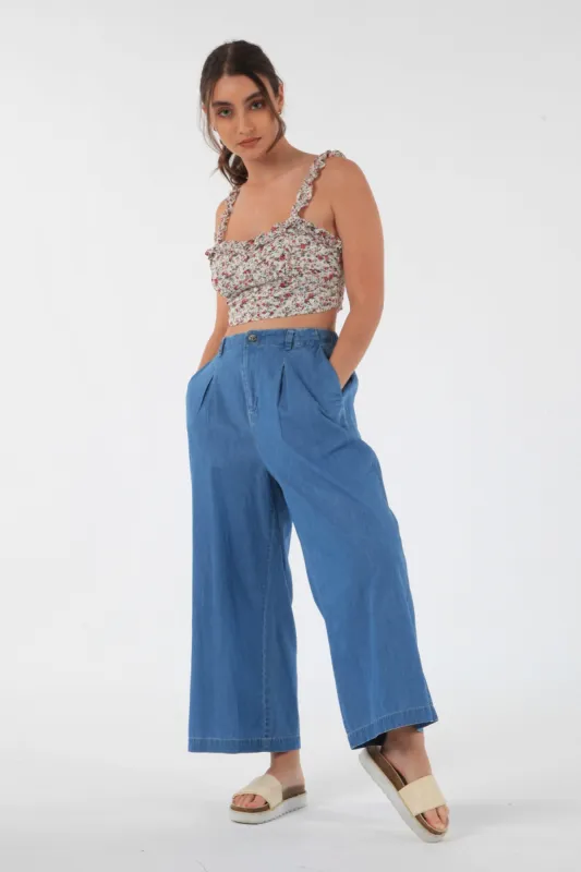 Blue Chambray Pants by Double Second sold by Goddiva