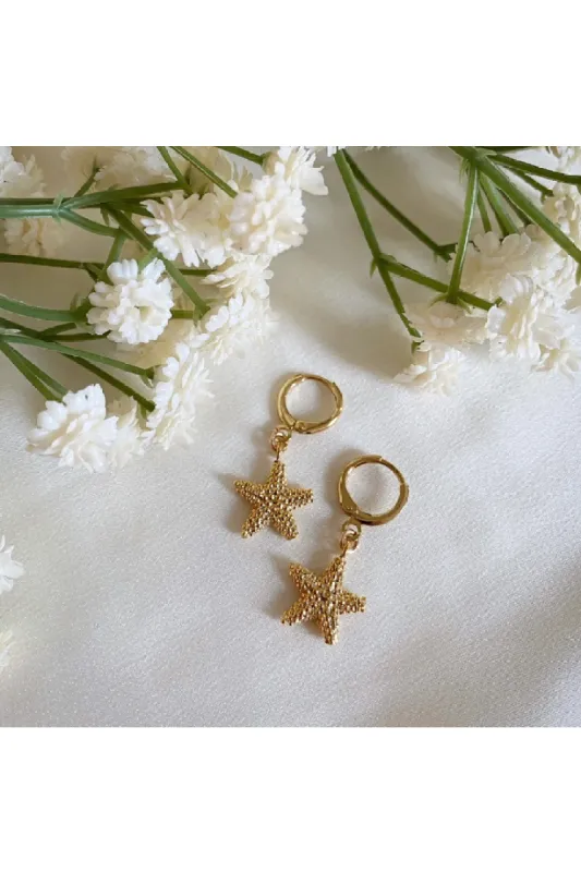 Wisteria London Isla Starfish Huggie Hoop Earrings sold by Goddiva