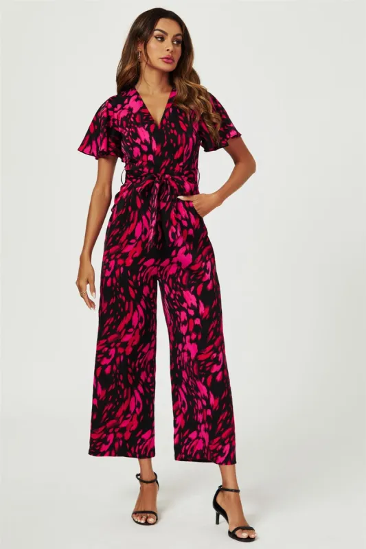 FS Collection Pink Abstract Print Wrap Top Jumpsuit In Black sold by Goddiva