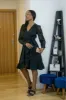 Black Wrap Dress With Sequin Sleeves by Double Second sold by Goddiva