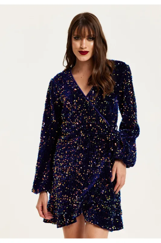 Liquorish Royal Blue Velvet Based Multicolour Sequin Mini Wrap Dress sold by Goddiva