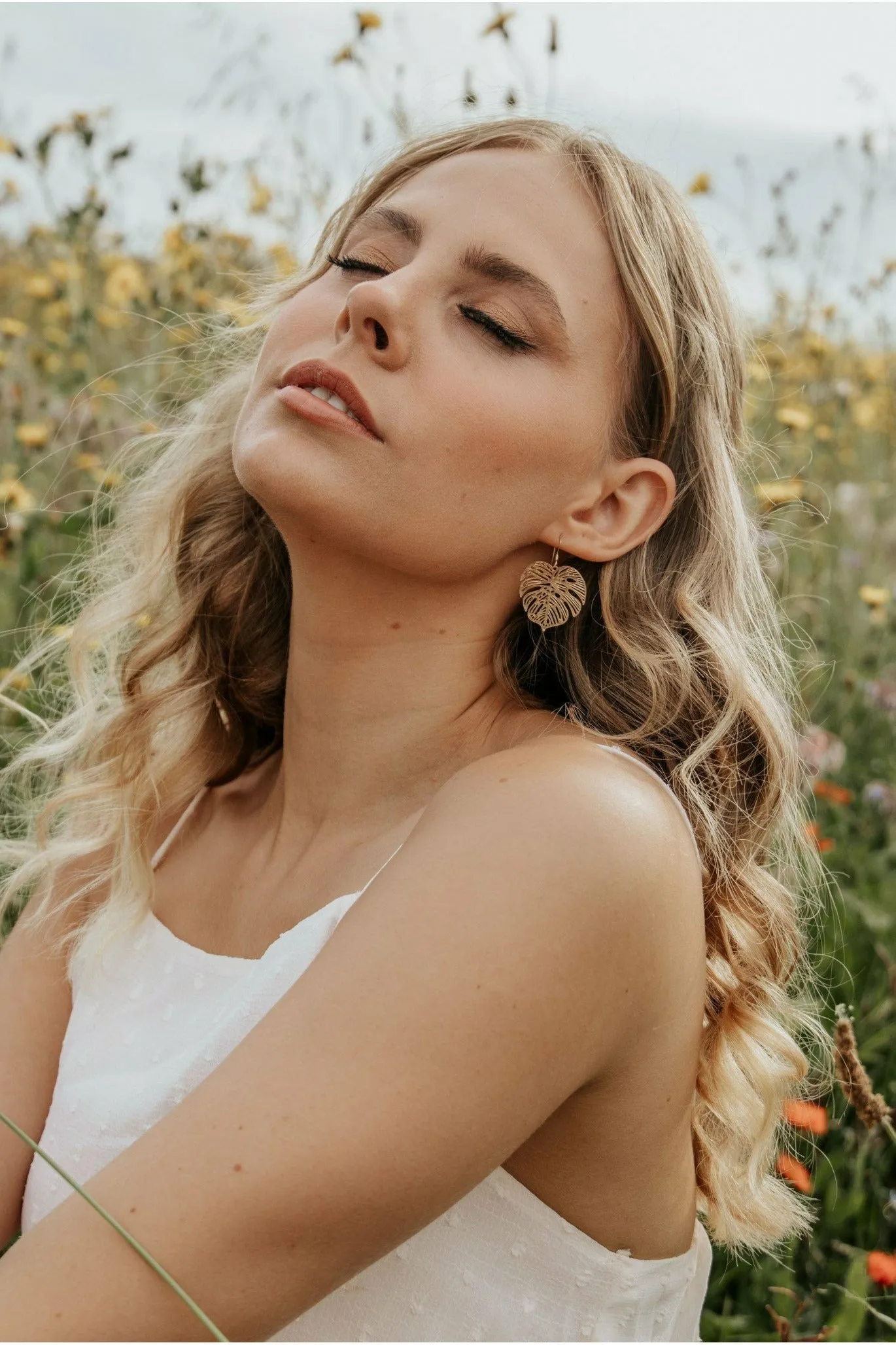 Wisteria London Gold Monstera Earrings sold by Goddiva product image thumbnail 2