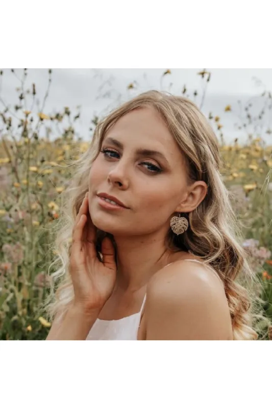 Wisteria London Gold Monstera Earrings sold by Goddiva