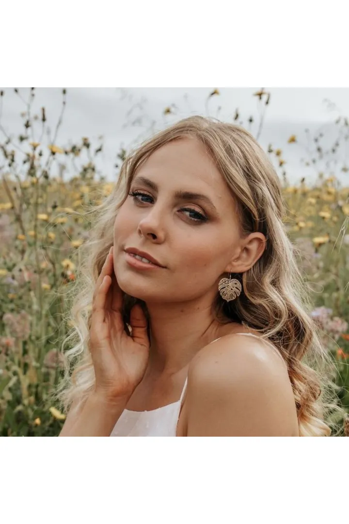 Wisteria London Gold Monstera Earrings sold by Goddiva