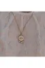 Wisteria London Amaya Evil Eye Necklace sold by Goddiva
