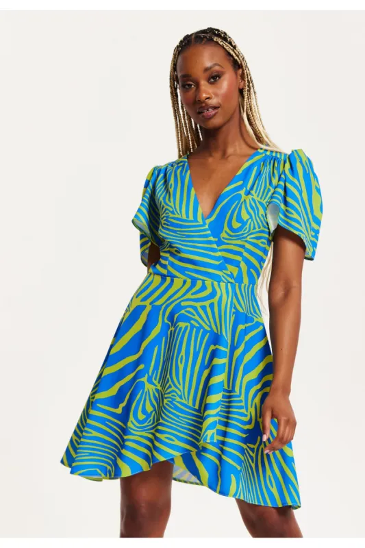 Liquorish Liquorish Angel Sleeve Mini Wrap Dress In Multi-coloured sold by Goddiva