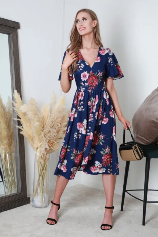 V-Neck Hanky Hem Pleated Floral Dress by Double Second sold by Goddiva