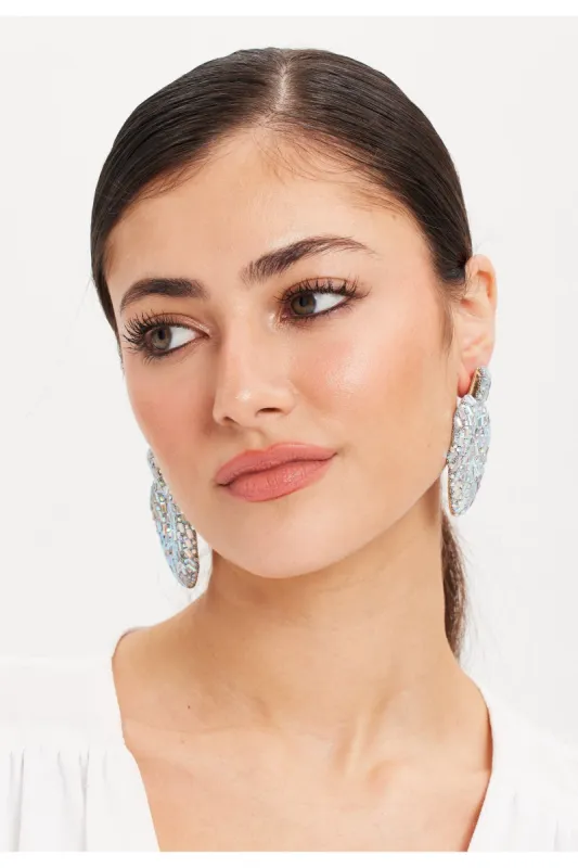 Liquorish Rhinestone Heart Shape Statement Earrings In Silver sold by Goddiva