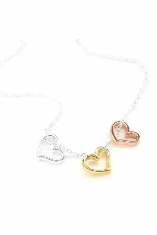 White Leaf Silhouette Heart Trio Necklace sold by Goddiva