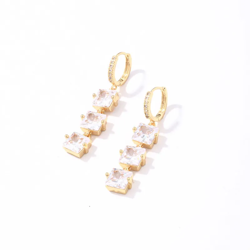 Triple Square Drop Cubic Zirconia Huggie In Gold by Last True Angel sold by Goddiva