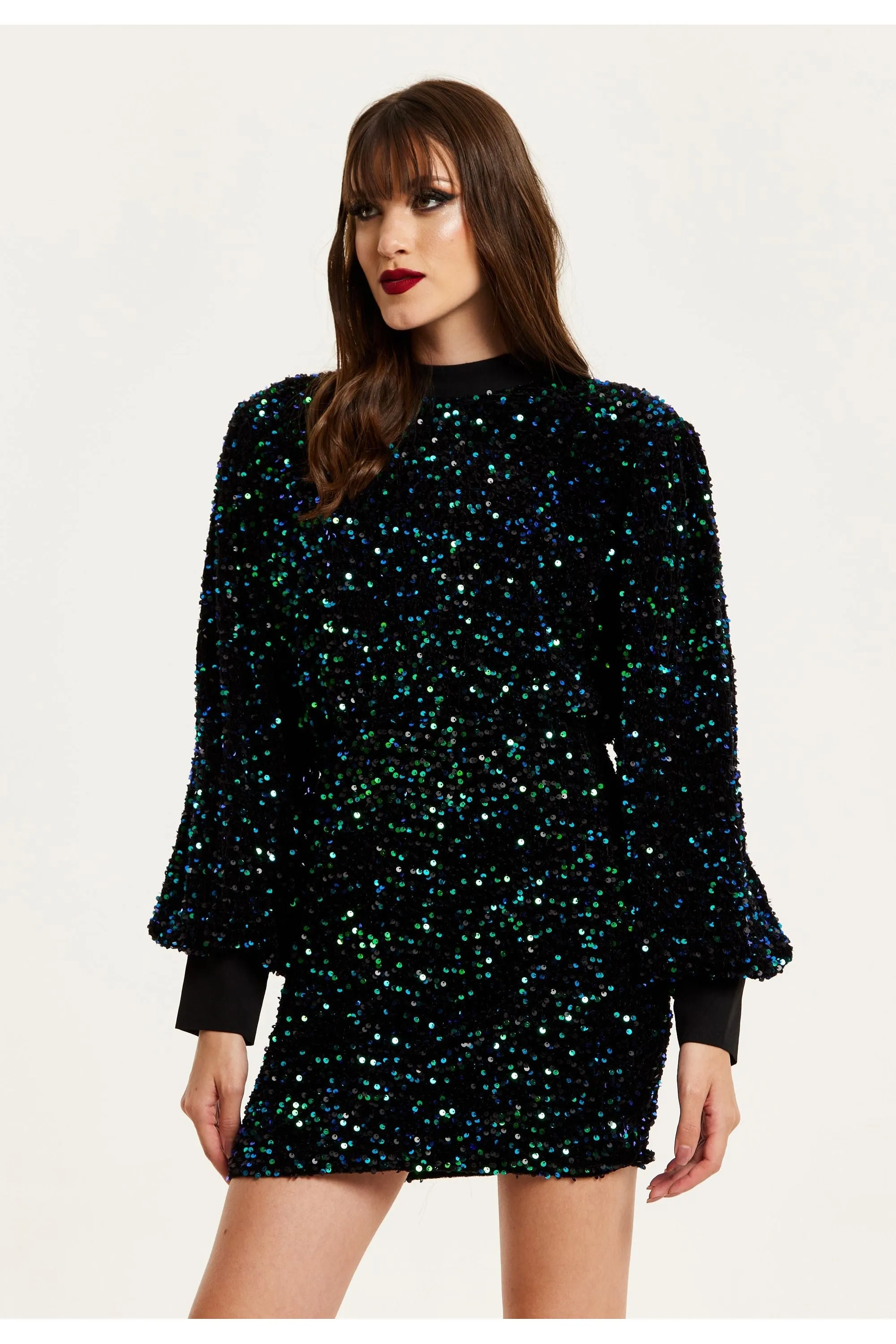 Black Velvet Based Green And Blue Sequin Mini Dress by Liquorish sold by Goddiva