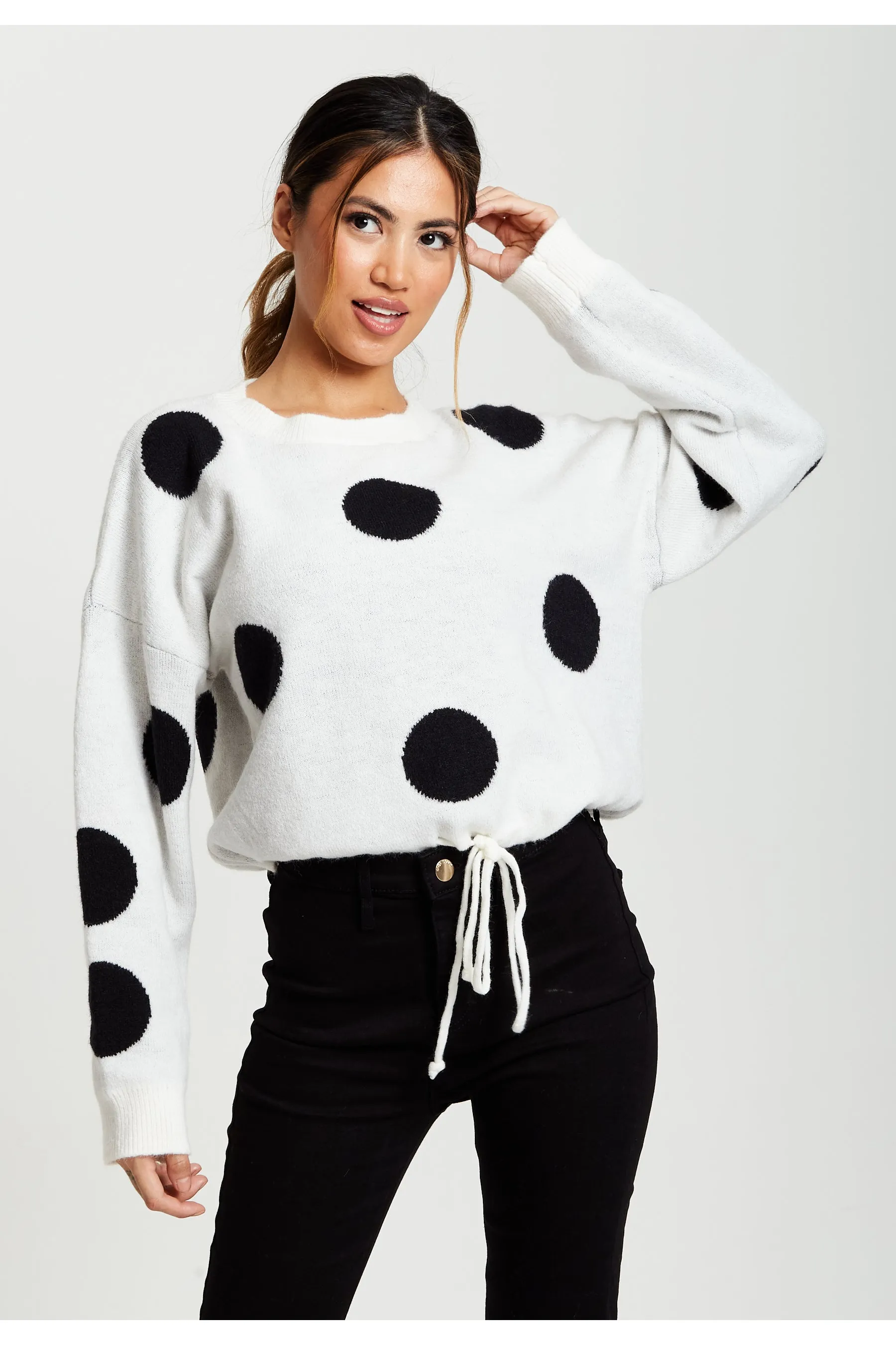Liquorish Black Polka Dot Jumper In White sold by Goddiva
