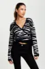 Liquorish Zebra Pattern Wrap Cardigan In Black And Whit sold by Goddiva