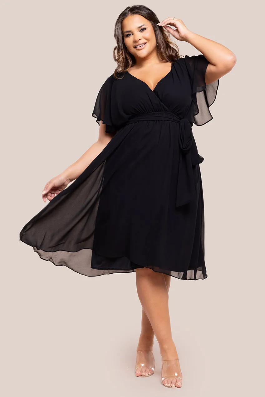 Goddiva Plus Flutter Sleeve Wrap Midi Dress - Black sold by Goddiva