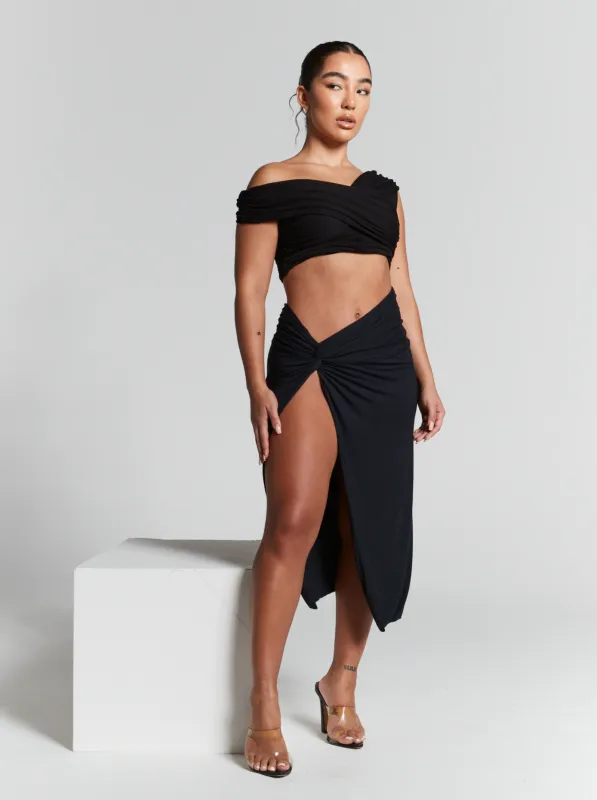 Lexi Black Ruched Knot Midi Skirt by InFlair sold by Goddiva