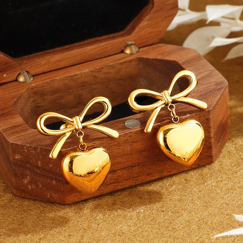Heart Pendant Bow Earring In Gold by Last True Angel sold by Goddiva