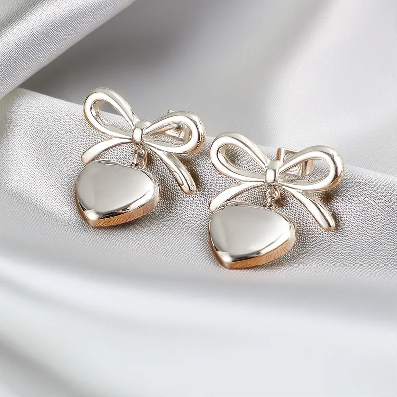 Heart Pendant Bow Earring In Silver by Last True Angel sold by Goddiva product image thumbnail 2