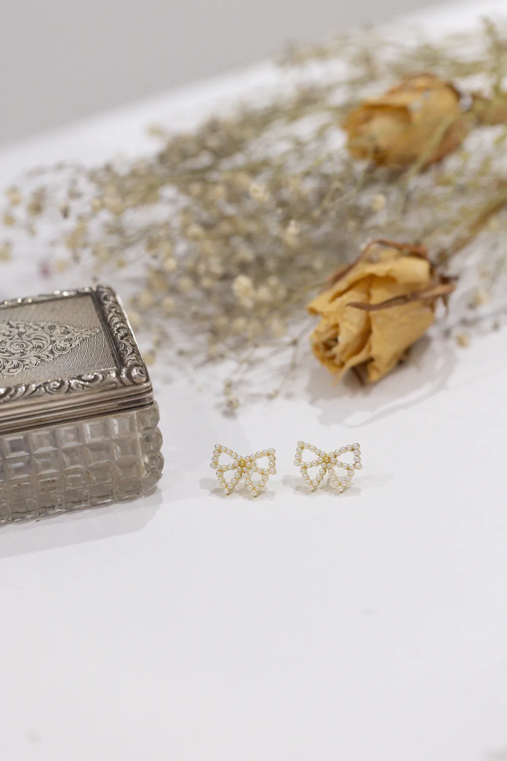 Pearl Bow Earrings by Last True Angel sold by Goddiva product image thumbnail 2