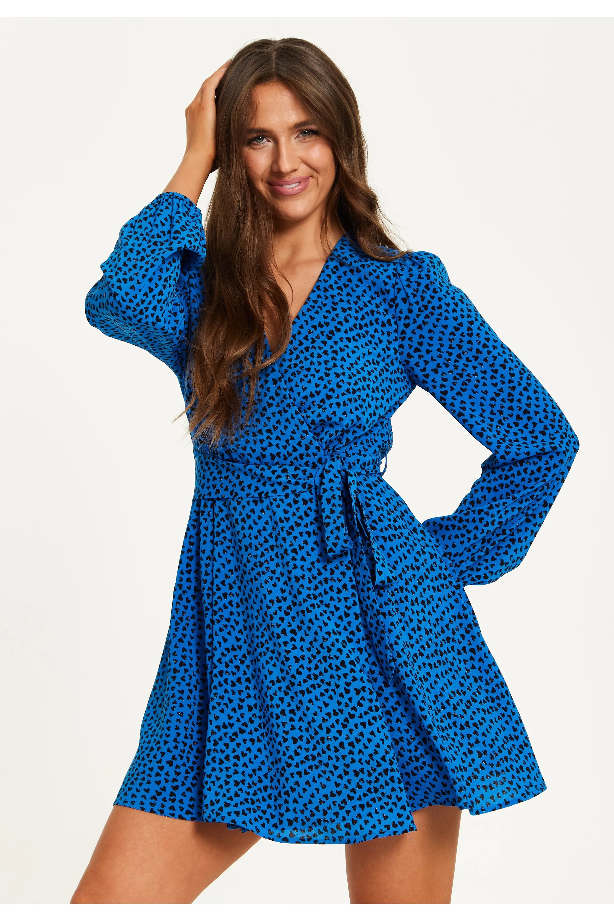 Heart Print Mini Wrap Dress by Liquorish sold by Goddiva