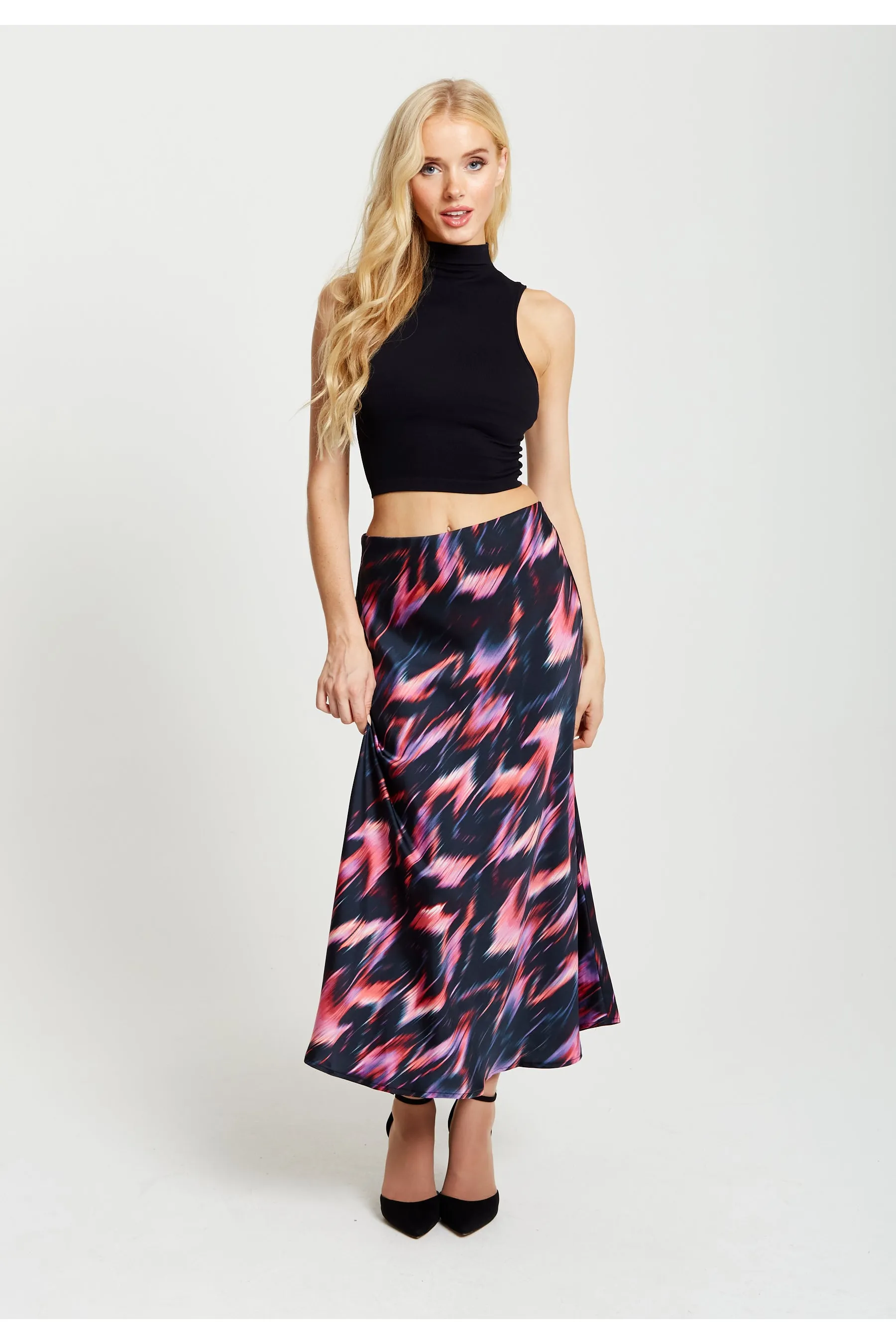 Liquorish Abstract Ikat Print Midi Skirt In Black And Pink sold by Goddiva