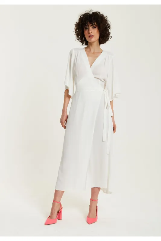 Midi Wrap Dress In White by Liquorish sold by Goddiva