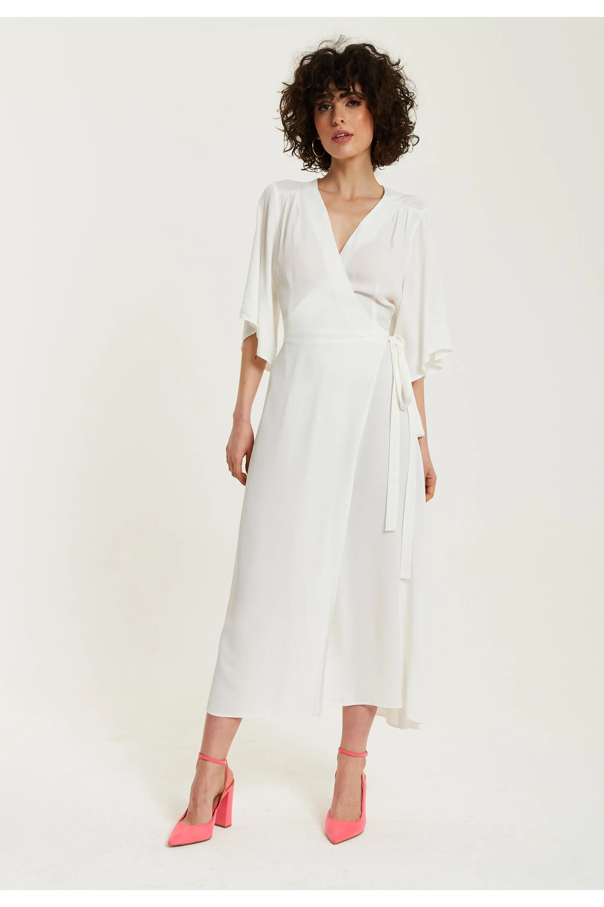 Midi Wrap Dress In White by Liquorish sold by Goddiva