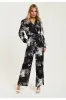 Mono Abstract Print Jumpsuit With Long Sleeves by Liquorish sold by Goddiva