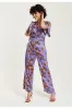 Purple Floral Wide Leg Jumpsuit With Angel Sleeves by Liquorish sold by Goddiva