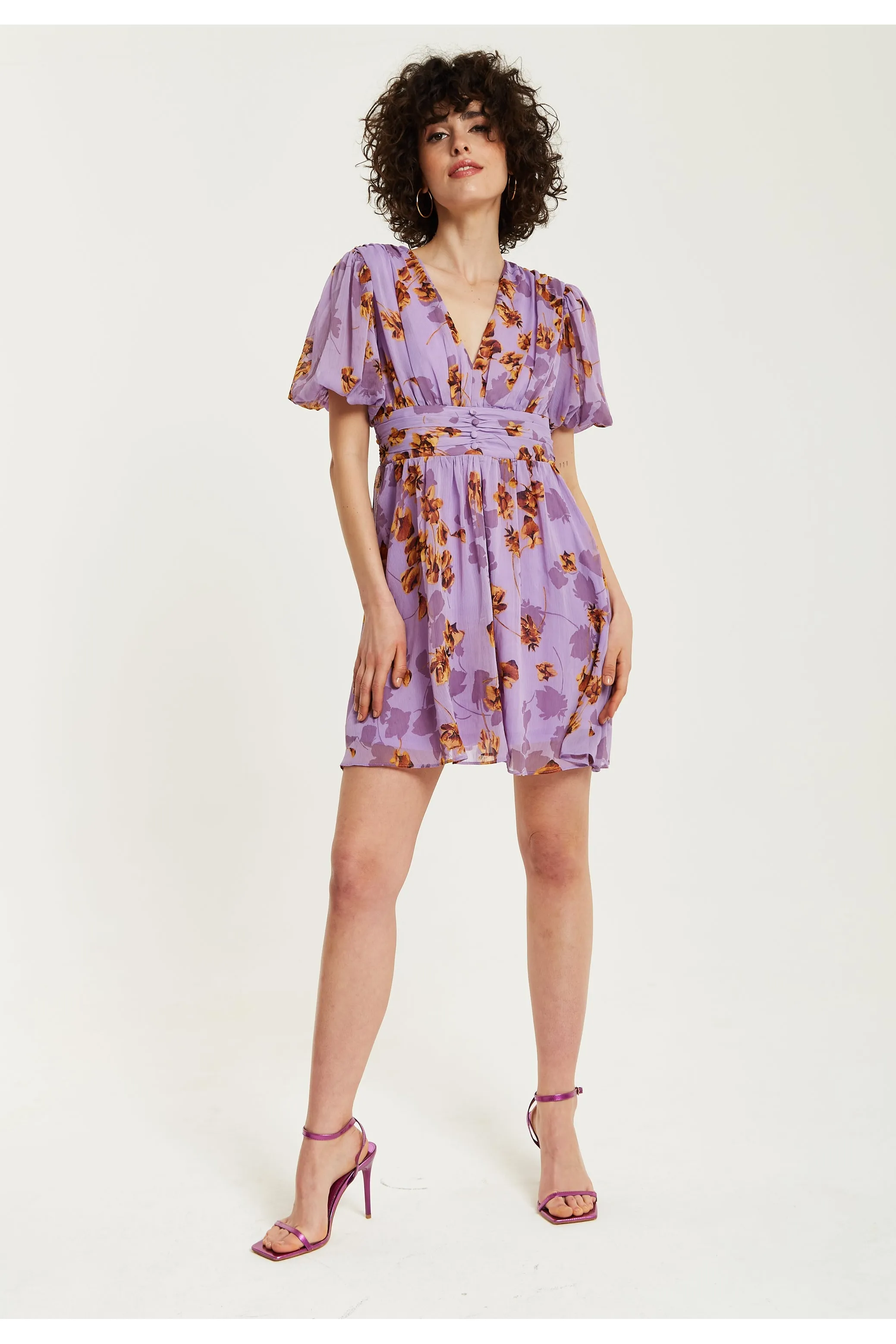 Liquorish Purple Floral V Neck Mini Dress sold by Goddiva