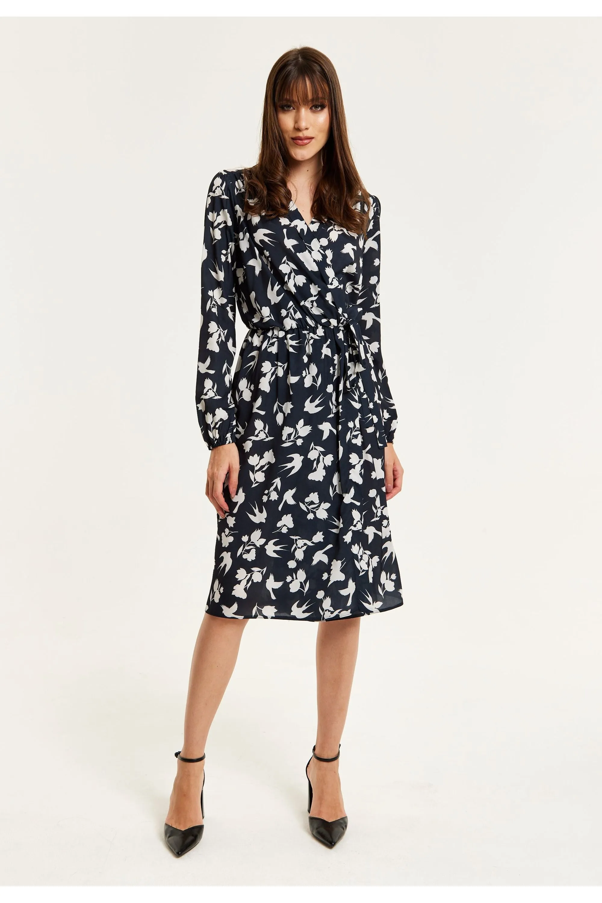 Liquorish Floral And Bird Print Midi Fake Wrap Dress In Black sold by Goddiva
