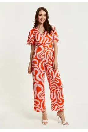Liquorish Pink And Red Abstract Print Jumpsuit With Short Sleeves sold by Goddiva