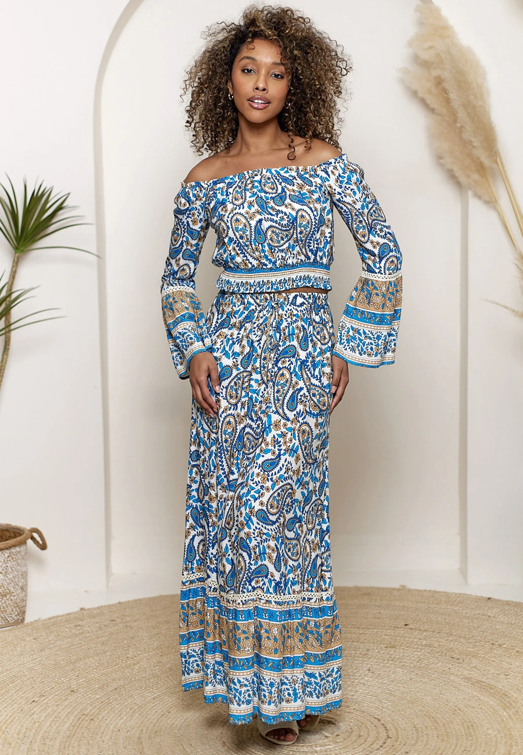 Boho Co-ord Bardot Top And Maxi Skirt Set In Blue Paisley Print by Angeleye sold by Goddiva
