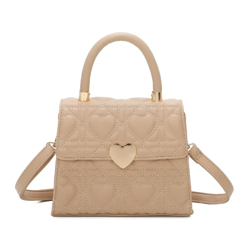 Quilted Heart Grab Bag In Beige by SVNX sold by Goddiva