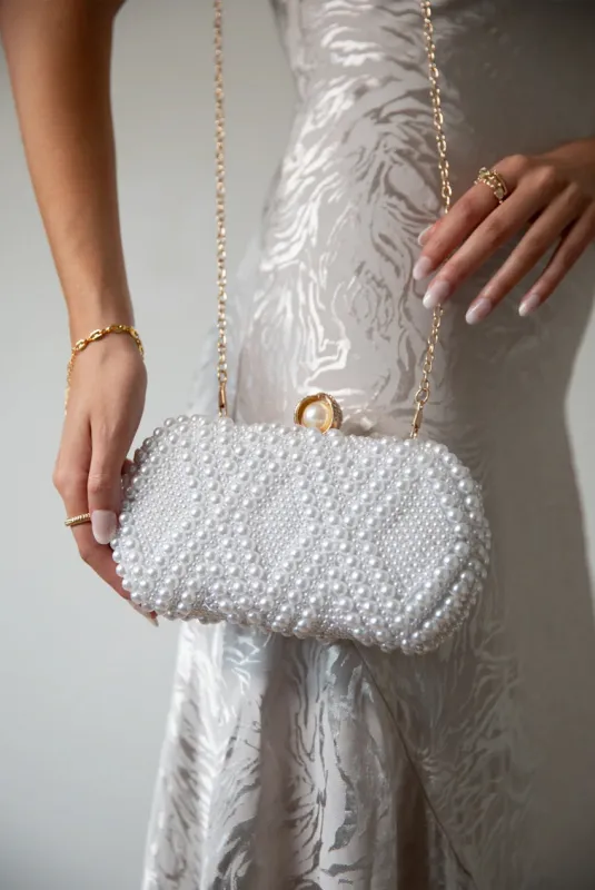 White Pearl Beaded Clutch Bag by SVNX sold by Goddiva