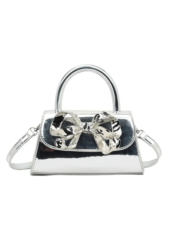 Metallic Bow Top Handle Bag In Silver by SVNX sold by Goddiva