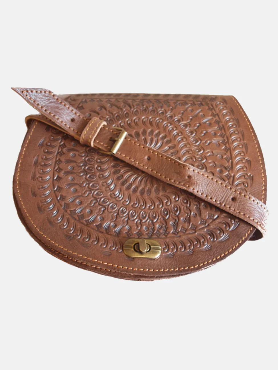The Temara Embossed Saddle Bag In Brown by Berber Leather sold by Goddiva