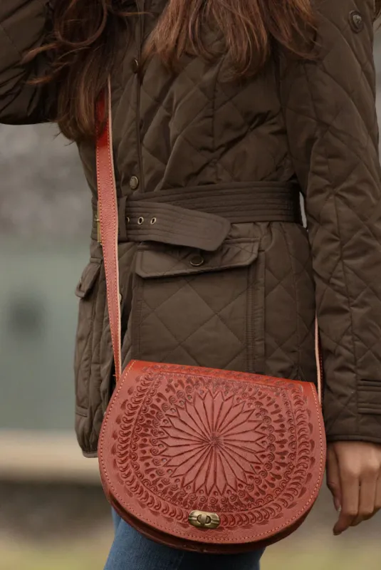 The Temara Embossed Saddle Bag In Light Brown by Berber Leather sold by Goddiva